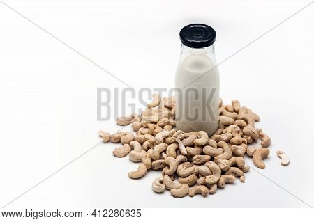 Cashew Nut Milk Homemade In Bottle On Isolated Background For Healthy Food Protine From Nuts.