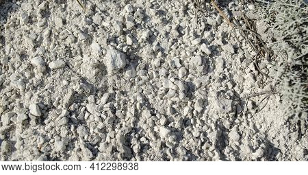 Small Stones Of Natural Chalk. Chalk Mountain Texture. Native Chalk. Chalk Mining Background Or Natu
