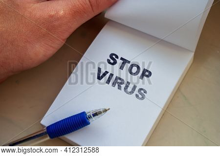 Stop Virus Message On Paper Sheet Note With Pen. Goodbye Coronavirus. Bye Bye Pandemic Life. New Lif