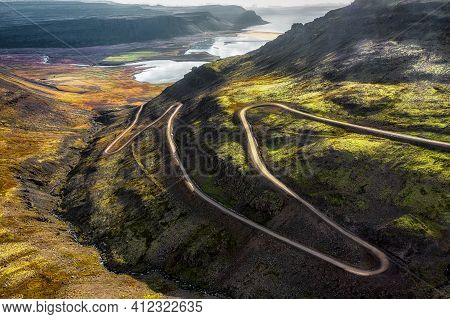 Raudasandur Switchbacks Leading Down To The Beautiful Pink Sand Beach And Arctic Atlantic Bay Below