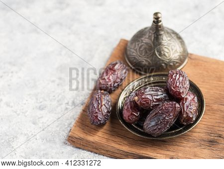 Hurma, Dates. Dried Dates Fruit On White Background. Popular Fruit Of Ramadan.