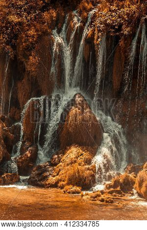 Autumn Gold Kravice Waterfall On The Trebizat River In Bosnia And Herzegovina. Fall Miracle Of Natur