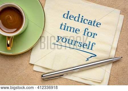 dedicate time for yourself inspirational note - handwriting on a napkin with a cup of coffee, self care and de-stress concept
