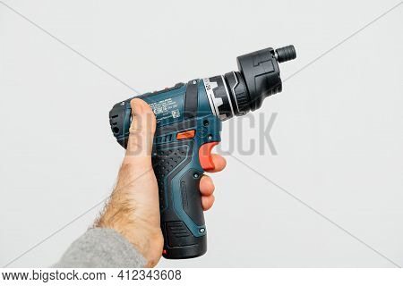 Paris, France - Dec 30, 2020: Pov Male Hand Holgining New Bosch Professional Gsr 12v-15 Fc Cordless 