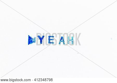 Blue Color Ink Of Rubber Stamp In Word Yeah On White Paper Background
