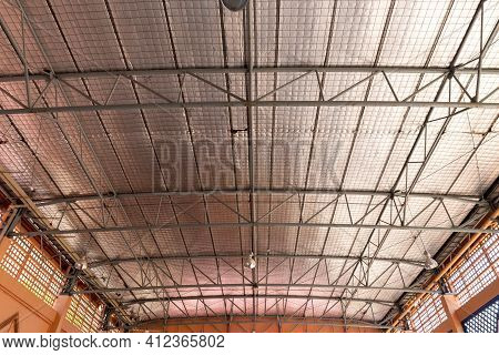 Steel roof structure. Moonlight bulb. Steel structure with roof tiles. Architectural structure of ro