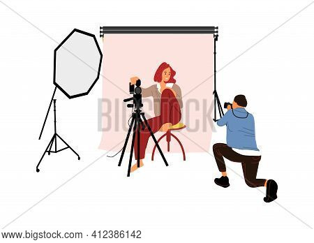 Photographer Shooting Model In Studio. Photo Session Concept. Man Taking Pictures With Professional 