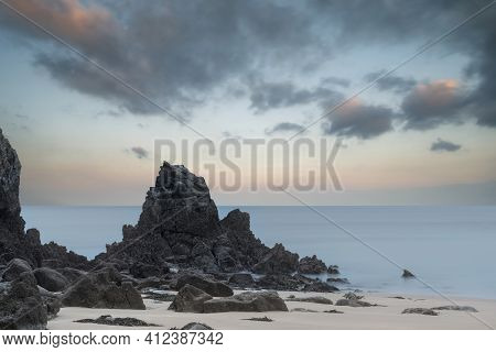 Beautiful Sunrise Landscape Image Of Barafundle Bay On Pembrokeshire Coast In Wales