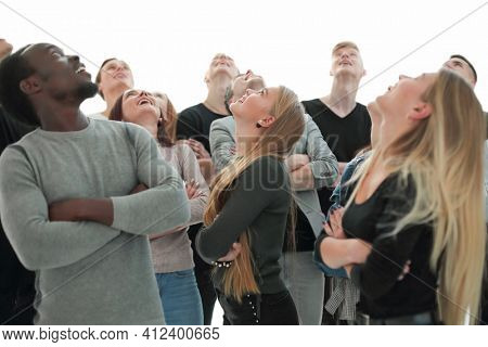large group of diverse young people looking somewhere up