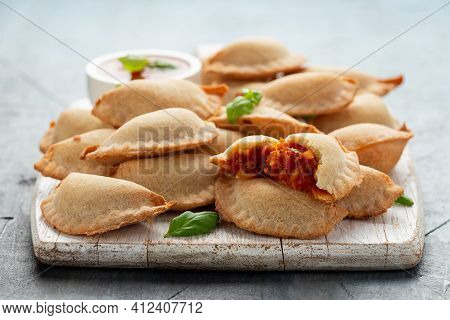 Margarita Margherita Pizza Parcels Pockets Filled With Tomato, Mozzarella Cheese And Basil Served On