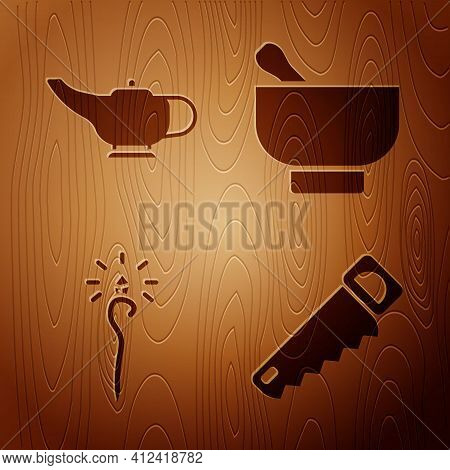 Set Hand Saw, Magic Lamp Or Aladdin, Magic Staff And Magic Mortar And Pestle On Wooden Background. V