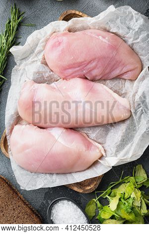 Crispy Garlicky Chicken Raw Ingredient  On Grey Background, Flat Lay