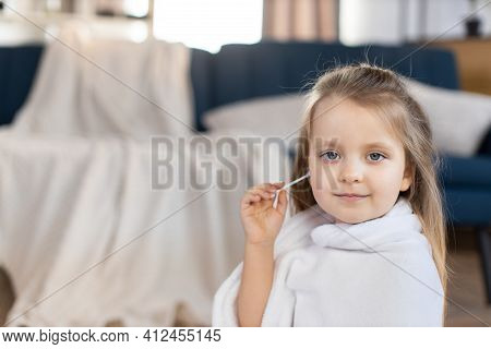 Close Up Indoor Portrait Of Happy Smiling Three Years Old Kid Girl, Posing At Home To Camera With Sm