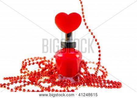Smalto per unghie rosso, cuore, perline