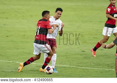Rio, Brazil - March 14, 2021: Thiaguinho Joao Gomes In Ball Dispute With Paulo Henrique Ganso Player