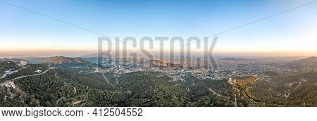 Panorama Aerial Drone Shot Of Tibidabo Mountain With City View Of Barcelona During Sunset