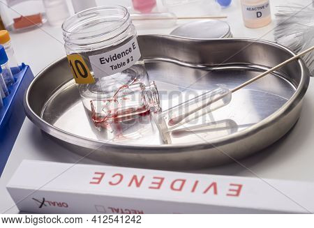 Blood-stained Glass Sample In An Evidence Jar, Concept Image