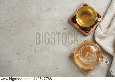 Buckwheat Tea And Granules On Light Table, Flat Lay. Space For Text
