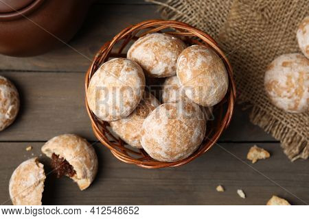 Tasty Homemade Gingerbread Cookies Basket On Wooden Table, Flat Lay