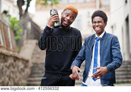 Two Afircan Man Friends Having Fun Outdoor.
