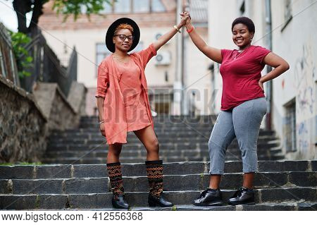 Two Afircan Woman Friends Having Fun Outdoor.