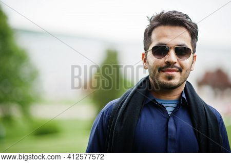 Stylish Pakistani Indian Muslim Arabic Man In Kurta Dhoti Suit And Sunglasses.