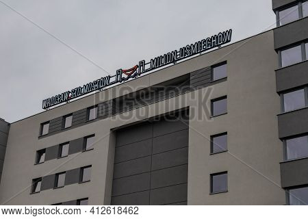 Wroclaw, Poland - May 23 2020: Colorful Sign On Top Of The Building 