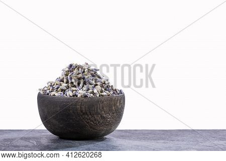 Dried Lavender Flowers In The Wooden Bowl - Lavandula.
