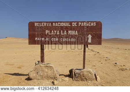 Paracas, Peru - April 17, 2014: Old Visitor Information Sign, In The Middle Of The Paracas Desert, N