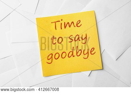 Note With Phrase Time To Say Goodbye On Paper Sheets, Top View