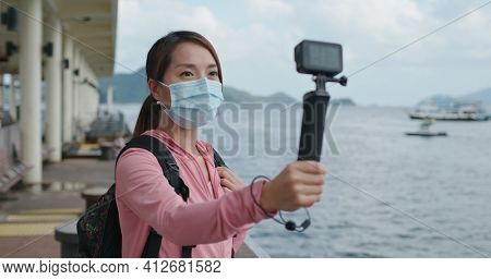 Hong Kong 22 September 2020: Woman take a video on Gopro camera