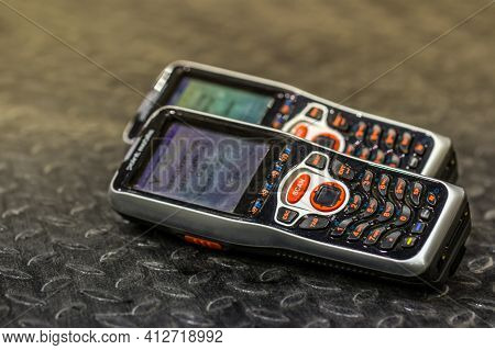 Moscow, Russia - December 16, 2020 Yolka Wms Barcode Scanner On Dark Metall Panel Close Up View. Yol