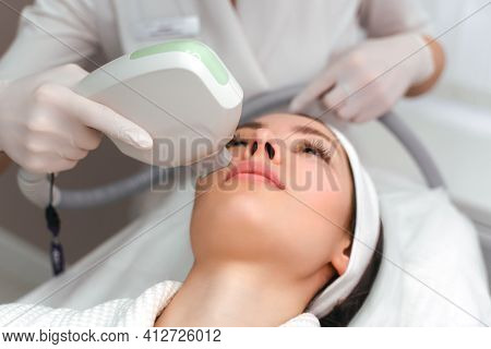 Woman Getting Facial Hydro Microdermabrasion Peeling Treatment At Cosmetic Beauty Spa Clinic. Hydra 