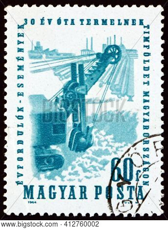 Hungary - Circa 1964: A Stamp Printed In Hungary Shows Excavating Bauxite, 30th Year Of Bauxite Mini