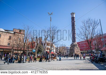 March 8, 2021 In Istanbul - Turkey Cemberlitas Square And Column. People And Mosques In The Historic