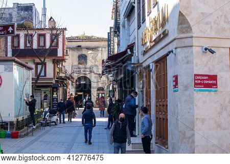 March 8, 2021 In Istanbul - Turkey Cemberlitas Square And Column. People And Mosques In The Historic
