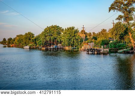 View From The Konka River To The Cottage Village In The Kherson Floodplain (ukraine) On A Sunny Summ