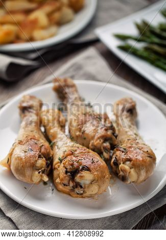 Roast Chicken On A Plate. High Quality Photo.