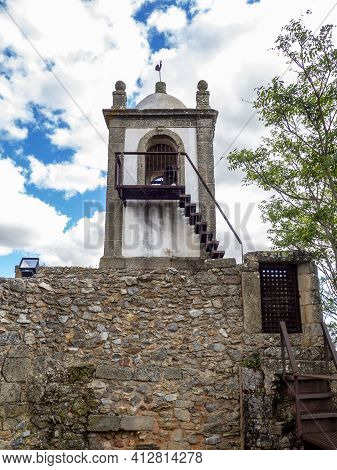 Castelo Rodrigo, Portugal - August  2020: View Of The Cobble Street Leading To The Clock Tower And T