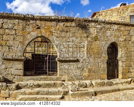 Castelo Rodrigo, Portugal - August  2020: View Of The Cobble Street Leading To The Clock Tower And T