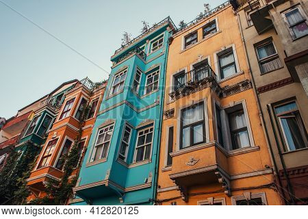 Low Angle View Of Colorful, Decorated Houses In Balat Quarter, Istanbul, Turkey.