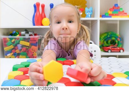 Speech Therapy, The Development Of Fine Motor Skills. Girl Playing Puzzle, Happy Child