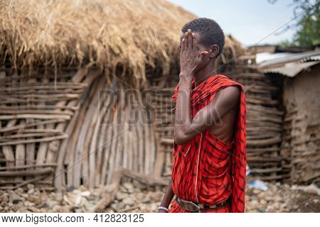 Tanzania, Masai Village - January 2020: Portrait Of Maasai Man People In Native Masai Village Engare