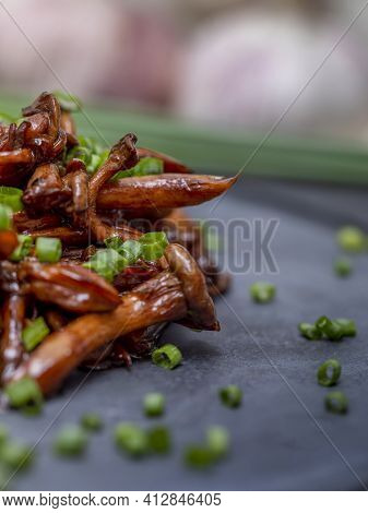 Shimeji Mushroom Served With Chives On Black Stone Plate. Typical Oriental Meal. Detail Of Food Dish