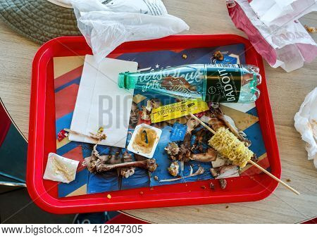 Overhead View Of Food Leftovers At Kfc Fast Food Restaurant With Badoit