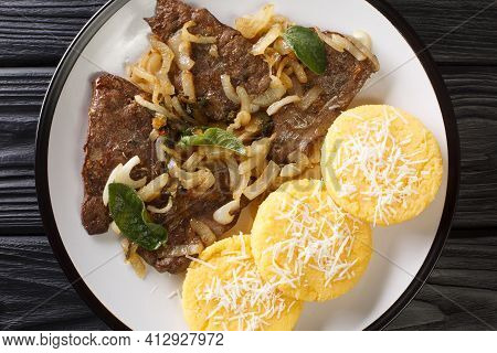 Liver With Onions Sage And Vinegar Fegato Alla Veneziana With Polenta Closeup In The Plate On The Ta