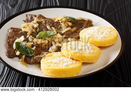 Italian Venetian Food Beef Liver With Onion And Sage, Served With Polenta Close-up In A Plate On The