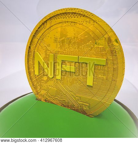 Gold Stylized Coin With The Inscription Nft In A Case Under A Glass Cover. Crypto Art Concept. 3D Re