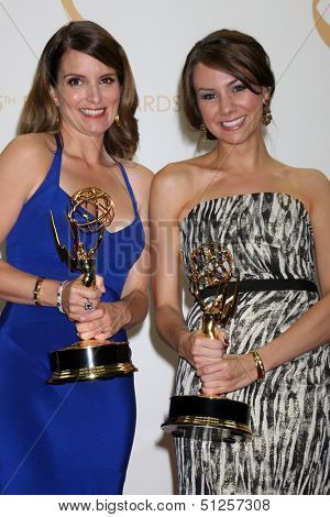 LOS ANGELES - SEP 22:  Tina Fey, Tracey Wigfield at the 65th Emmy Awards - Press Room at Nokia Theater on September 22, 2013 in Los Angeles, CA