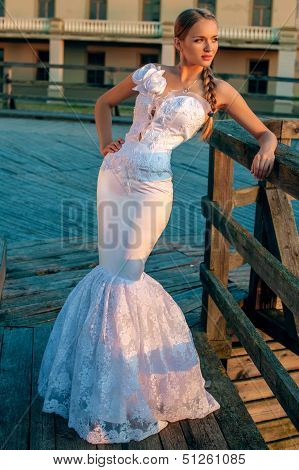 Beautiful Blonde Haired Woman In Bridal Dress